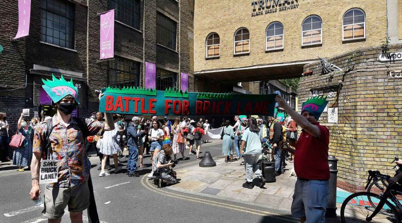 Marching below the Truman brewery, Battle for Brick Lane campaign.