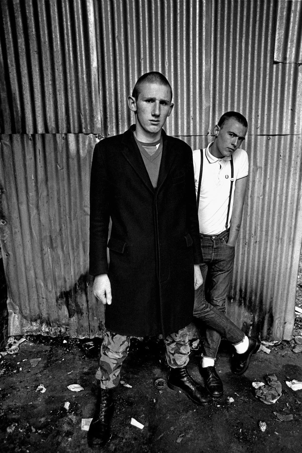 Two anti-racist skinheads pose for the camera, Petticoat Lane, 1979, Whitechapel.