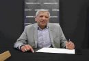 Unmesh Desai signing papers for London assembly