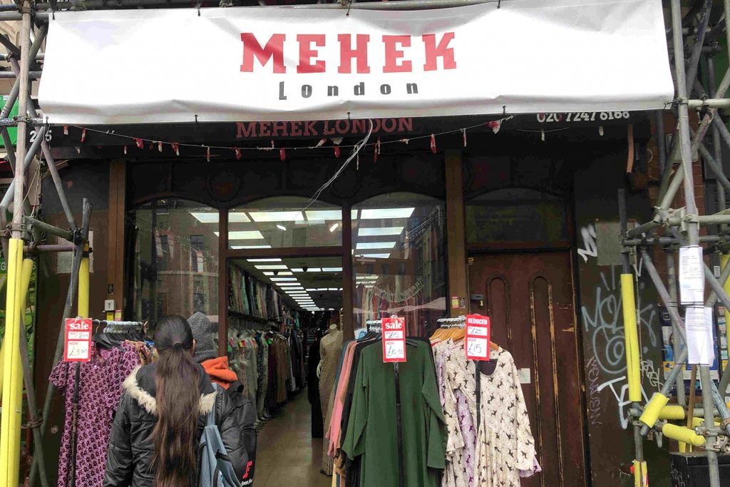 Mehek saree shop on Whitechapel Highstreet, displaying South Asian clothing for sale.