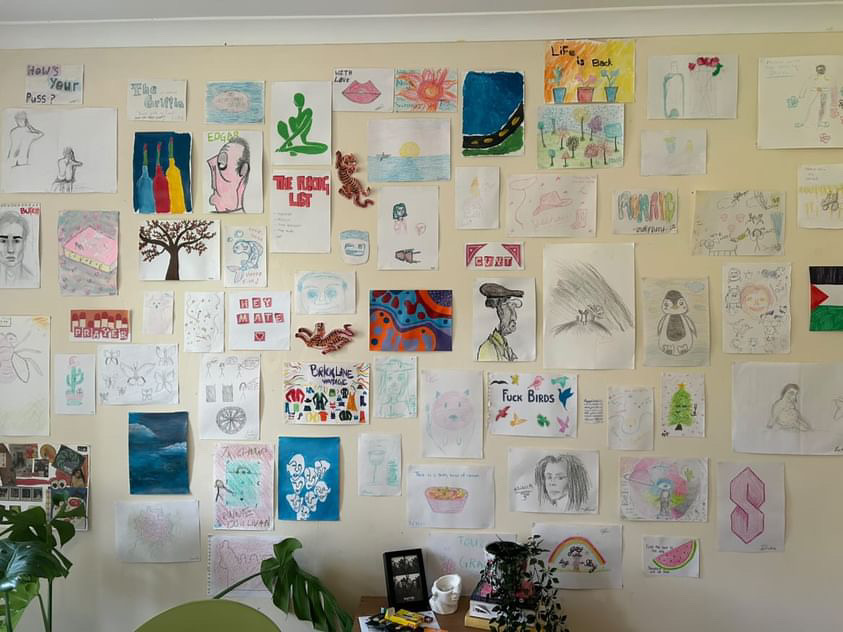 Victoria's wall of art in her home in Aldgate East