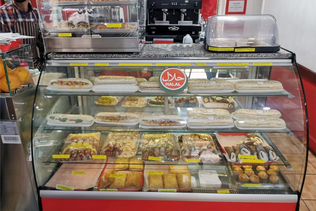 A display of various pastries and sandwiches with Italian and Bengali influences, Whitechapel